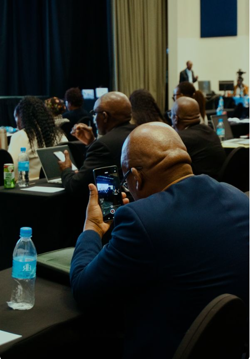 Delegates seated at a trade conference